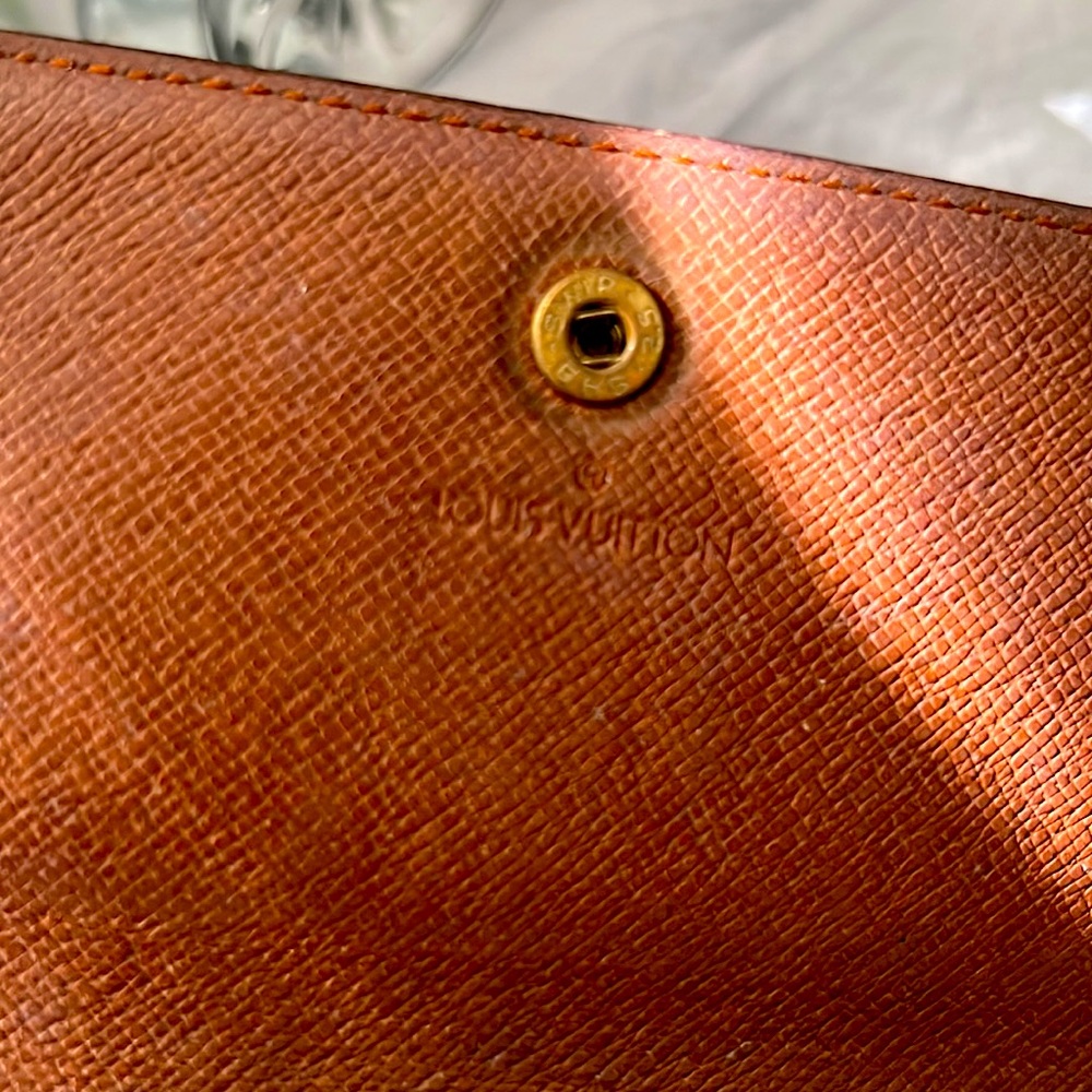 Louis Vuitton wallet-estate sale items used in a film as props are now for sale—